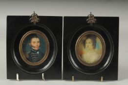 A PAIR OF FRAMED MINIATURES.