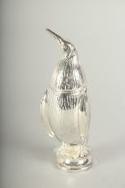 A PENGUIN SILVER PLATED SUGAR SIFTER.
