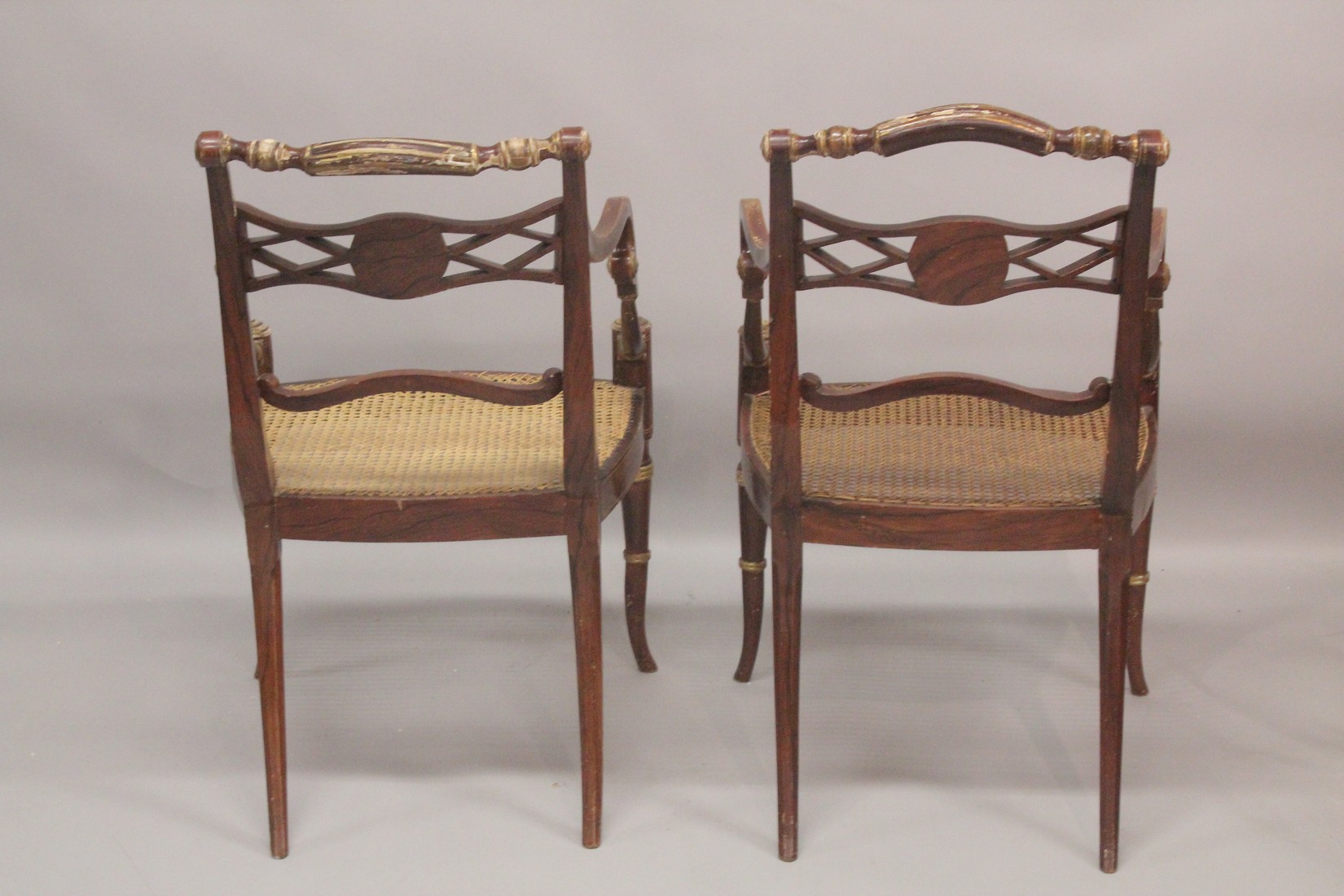 A GOOD PAIR OF REGENCY THOMAS HOPE DESIGN BLACK JAPANNED AND GILDED ARM CHAIRS with rope back, - Image 6 of 6