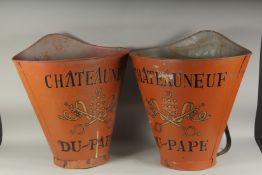 A PAIR OF CHATEAU NEUF DU PAPE TIN GRAPE CARRIERS. 23ins high.