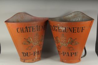 A PAIR OF CHATEAU NEUF DU PAPE TIN GRAPE CARRIERS. 23ins high.