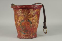 AN EARLY LEATHER METAL BOUND FIRE BUCKET with Royal Crest. 11ins high.