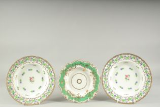 A PAIR OF CORNFLOWER PATTERN PLATES and a GILT PLATE (3).