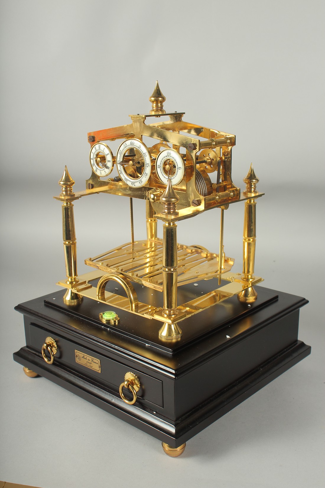 A GOOD ROLLING BALL CLOCK with three dials in a glass case. 16ins high overall. - Image 3 of 4