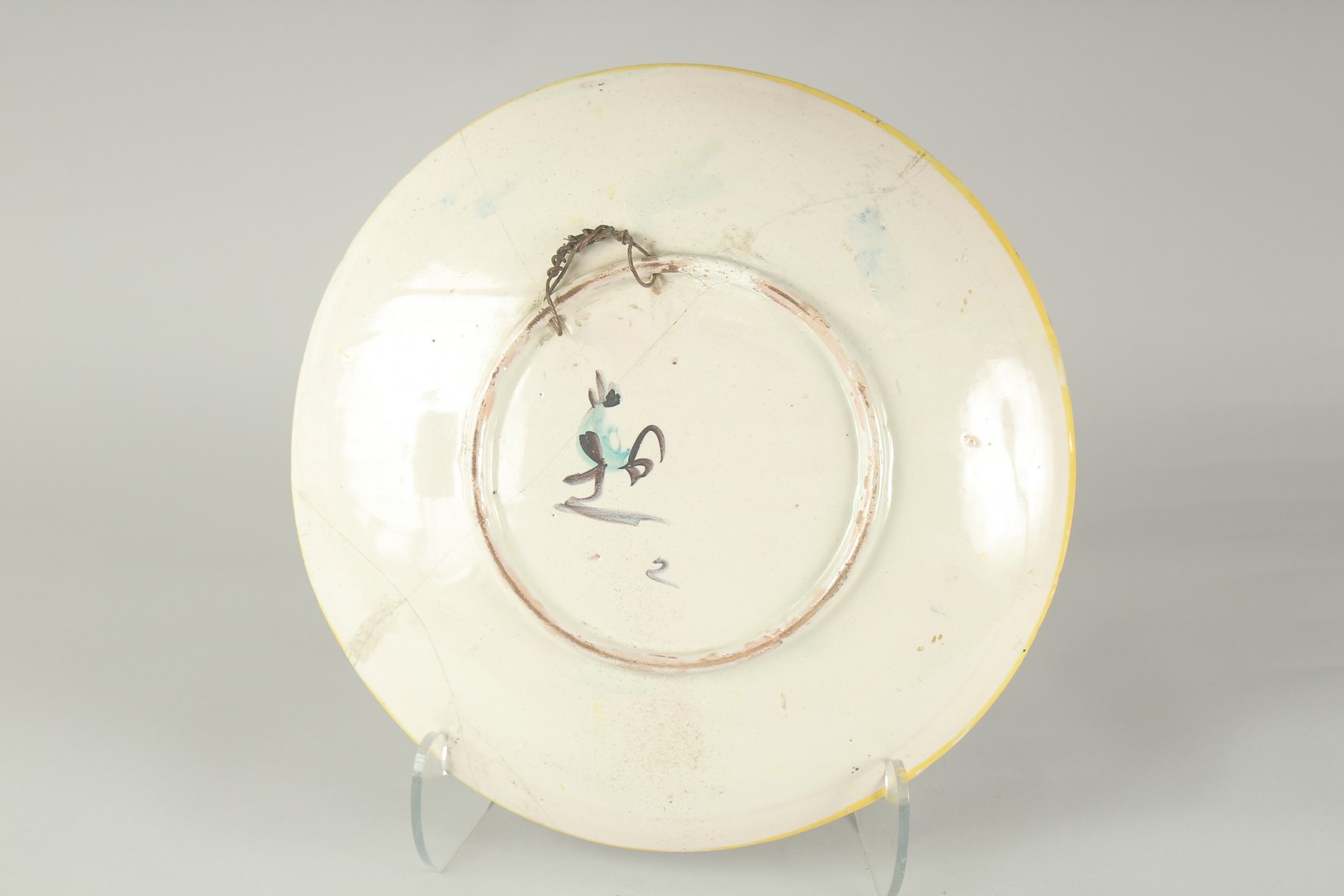 A CANTAGALLI ITALIAN POTTERY CIRCULAR CHARGER, the centre with a man on horseback. 14ins diameter, - Image 2 of 3
