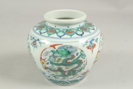 A CHINESE MULTI COLOURED DRAGON VASE, six character mark. 4.5ins high.
