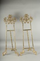 A LARGE PAIR OF BRASS EASLES. 30ins high.