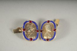 A PAIR OF RUSSIAN SILVER AND BLUE ENAMEL CUFF LINKS.