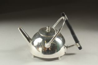 A CHRISTOPHER DRESSER STYLE CIRCULAR SHAPED SILVER PLATED TEA POT.