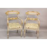 A GOOD PAIR OF REGENCY CREAM PAINTED AND GILDED ARM CHAIRS with accanthus curving drop in padded