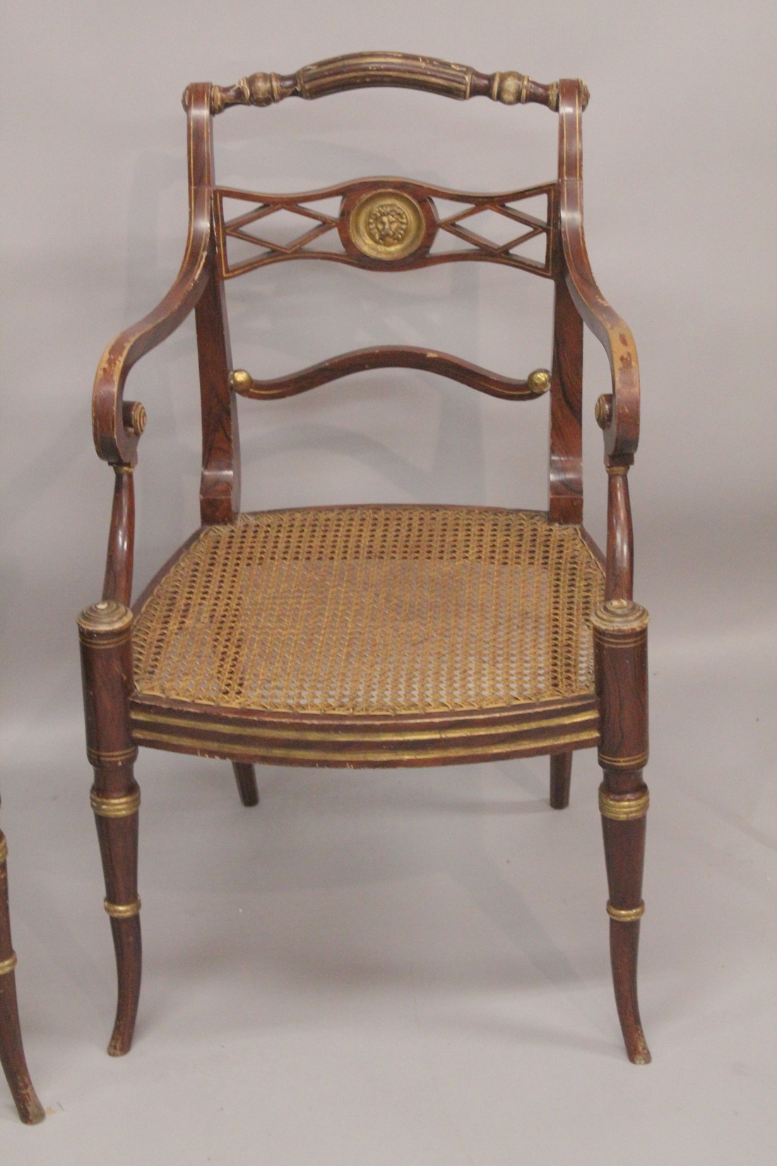 A GOOD PAIR OF REGENCY THOMAS HOPE DESIGN BLACK JAPANNED AND GILDED ARM CHAIRS with rope back, - Image 3 of 6
