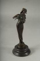 THE BRONZE VIOLIN GIRL on a circular base. 7.5ins high.