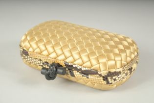 BOTTEGA VENETO. A GOLD WOVEN CLUTCH BAG. 6.5ins long.