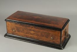 A GOOD 19TH CENTURY WALNUT CASE MUSICAL BOX " SUBLIME HARMONIIES PATENT" 1875. 2ins brass drum.