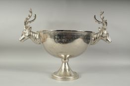 A LARGE CIRCULAR WINE COOLER with two stags head handles. 14ins diameter.