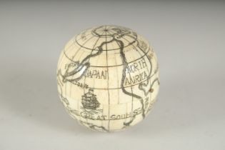 A LARGE ETCHED BONE FOLDING GLOBE COMPASS. 2.5ins diameter.