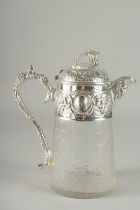 A LARGE CUT GLASS AND SILVER PLATED GREEN CLARET JUG. 10ins high..