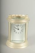 A SMALL ROUND SILVER CARRIAGE CLOCK. 7cm high.