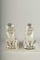 A PAIR OF .800 SILVER PLATED DECO STYLE CAT SALT AND PEPPERS. 7.5cm high.