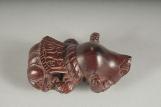 A JAPANESE CARVED WOOD FROG,signed, 2ins long.