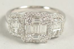 A SUPERB 14CT WHITE GOLD DECO DESIGN TRIPLE CLUSTER DIAMOND RING. Size N.