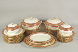 A MAPLE OF LONDON PORCELAIN DINNER SERVICE with blue and gilt border comprising two circular