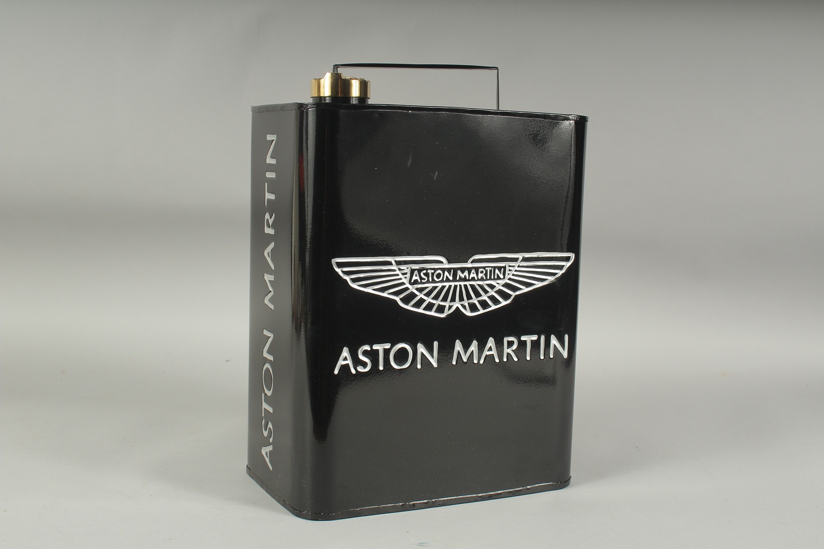 AN OIL CAN "ASTON MARTIN".