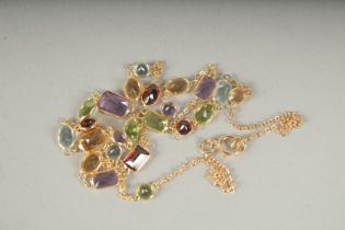 AN 18CT YELLOW GOLD MULTI STONE NECKLACE in a box.