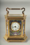 AN OCTAGONAL BRASS AND ENAMEL CARRIAGE CLOCK with column sides. 5ins high.