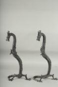A PAIR OF JAPANESE BRONZE DRAGONS. 13ins high.