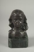 A SMALL BRONZE BUST OF A YOUNG GIRL. Signed, 4ins on a marble base.