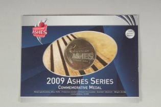 THE ROYAL MINT. 2009 ASHES SERIES COMMEMORATIVE MEDAL on a card.