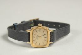 A GIRARD PERREGAUX LADIES 18CT GOLD WRISTWATCH, with leather strap, with original box.