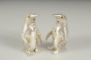 A PAIR OF .800 SILVER PLATED PENGUIN SALT AND PEPPERS. 5cm high.