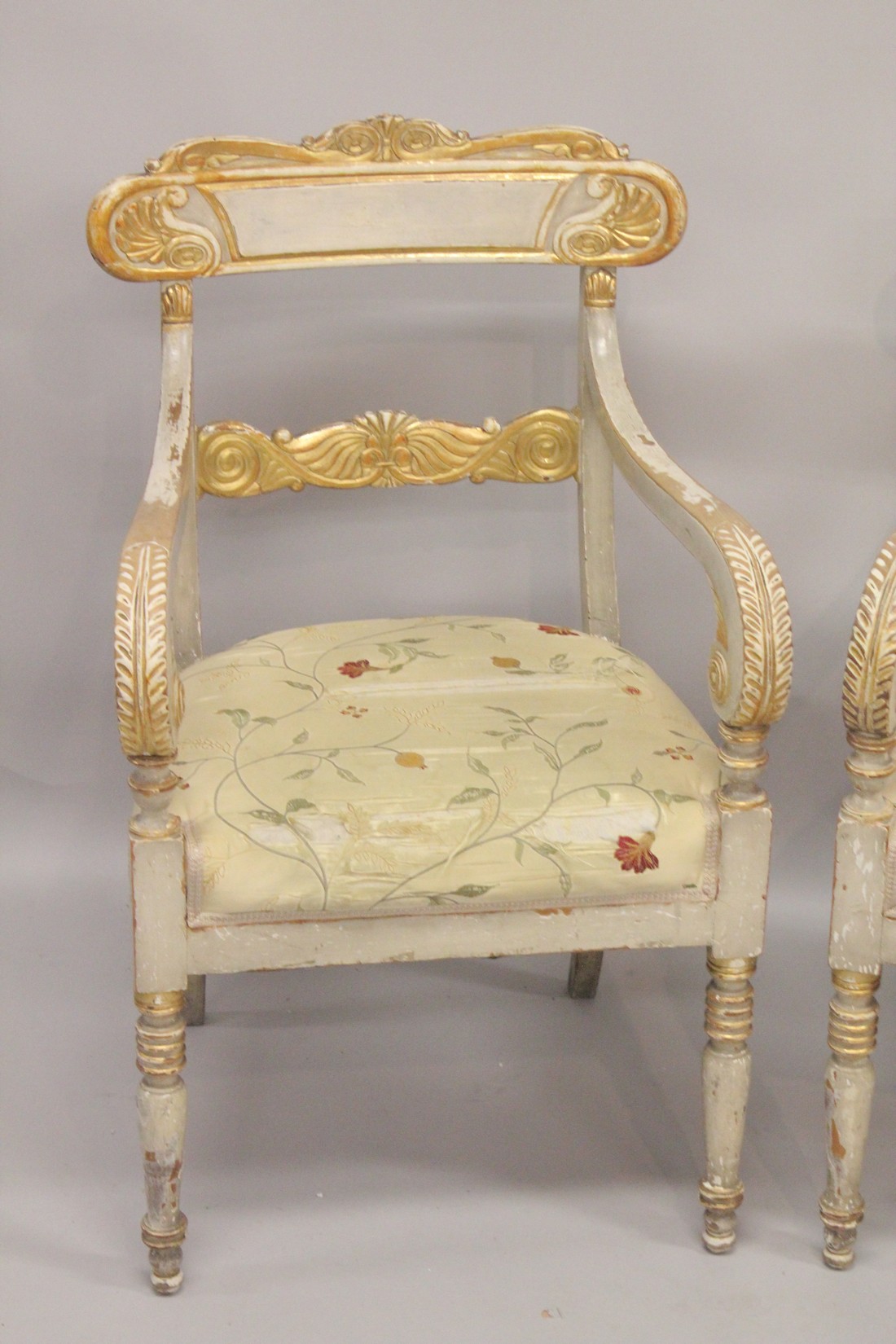 A GOOD PAIR OF REGENCY CREAM PAINTED AND GILDED ARM CHAIRS with accanthus curving drop in padded - Image 2 of 3