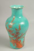 A CHINESE VASE with a bird in a tree design, blue square mark. 10ins high.
