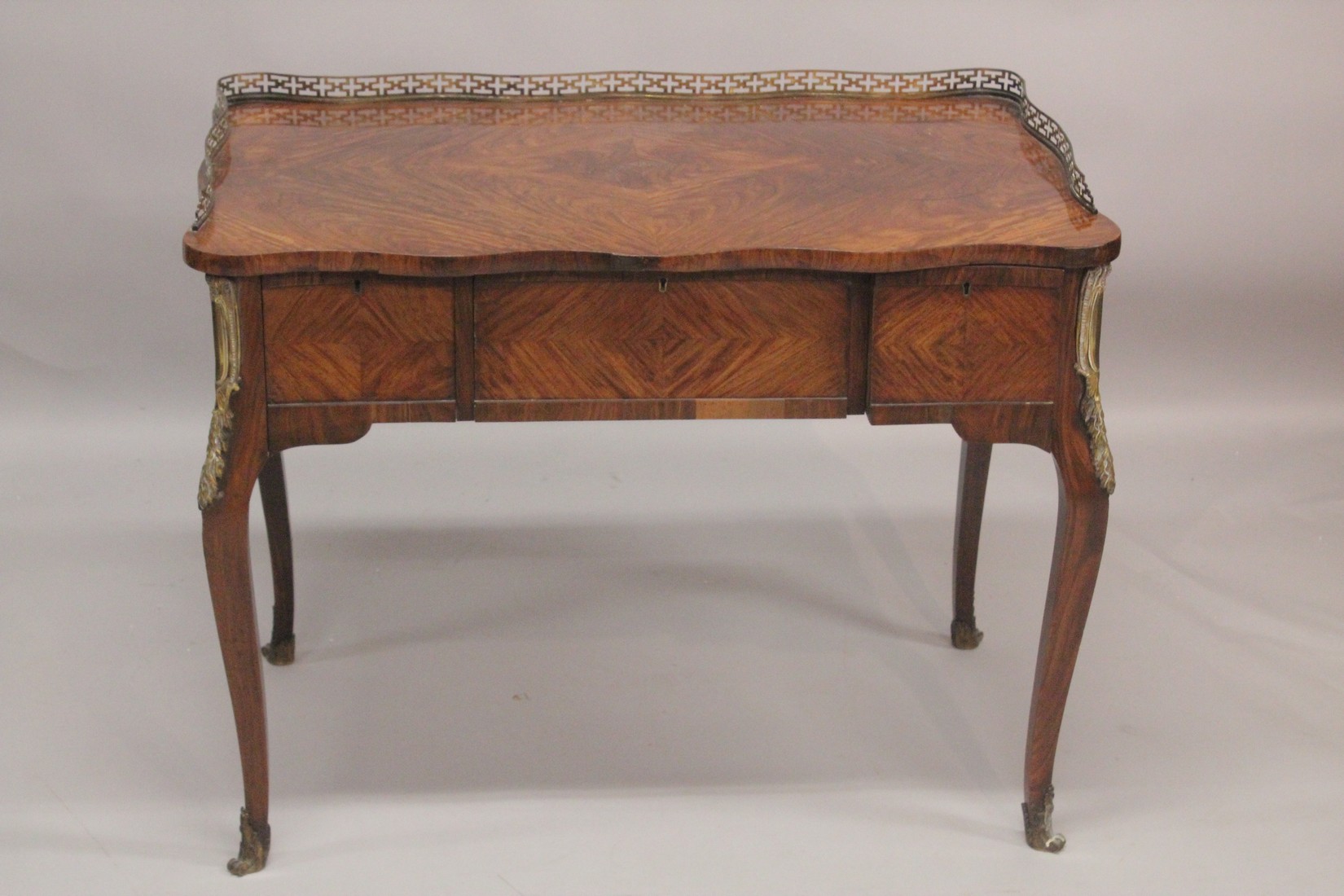 AGOOD 19TH CENTURY FRENCH KINGWOOD PADROUSE with brass galley and quartered top, three freize