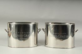 A PAIR OF ALFRED GRATIEN OVAL TWO HANDLED ICE BUCKETS. 9ins wide.