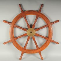 A SHIP'S WHEEL.