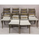 A SET OF TEN REGENCY BLACK JAPANNED AND GILDED DINING CHAIRS, 8 single and 2 carvers with canework