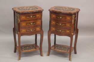 A GOOD PAIR OF LOUIS XVITH STYLE INLAID BEDSIDE CABINET with three drawers and under tier. 1ft