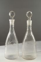A PAIR OF GEORGIAN ENGRAVED DECANTER AND STOPPER.