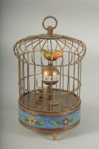 A BIRDCAGE CLOCK with cloisonne enamel base. 7.5ins high.