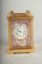 A MINIATURE FRENCH SEVRES DESIGN PINK CLOCK. 2.52ins.