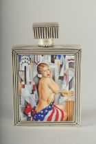 AN .800 SILVER PLATE AND ENAMEL GLAMOUR NUDE PERFUME BOTTLE.