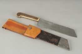 A GERMAN KNIFE with bone handle in a leather sheath. Blade 8.5ins long.