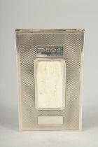 AN ENGINE TURNED SILVER CARD HOLDER. 3ins x 1.75ins. Birmingham.