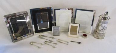 Collection of silver plate picture frames, sugar nips and engraved detail hot water jug