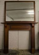 Mahogany fire surround (opening 96cm by 98cm) with a wall mirror