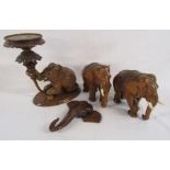 Wooden carved elephants includes a wall hanging head, a pair of elephants (one damaged to ear)